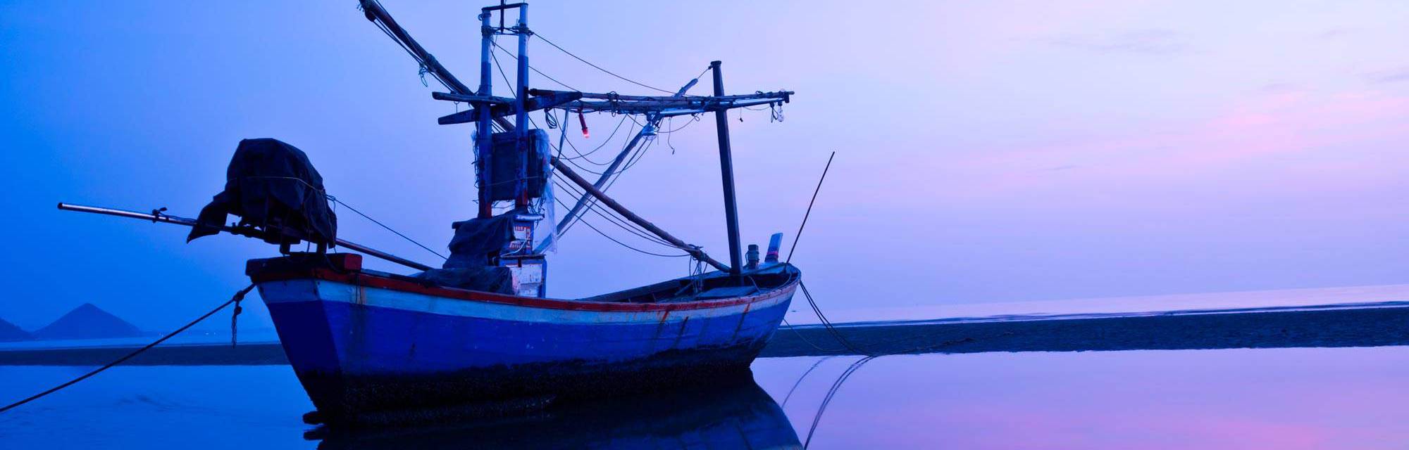 In barca sul Mare al Tramonto